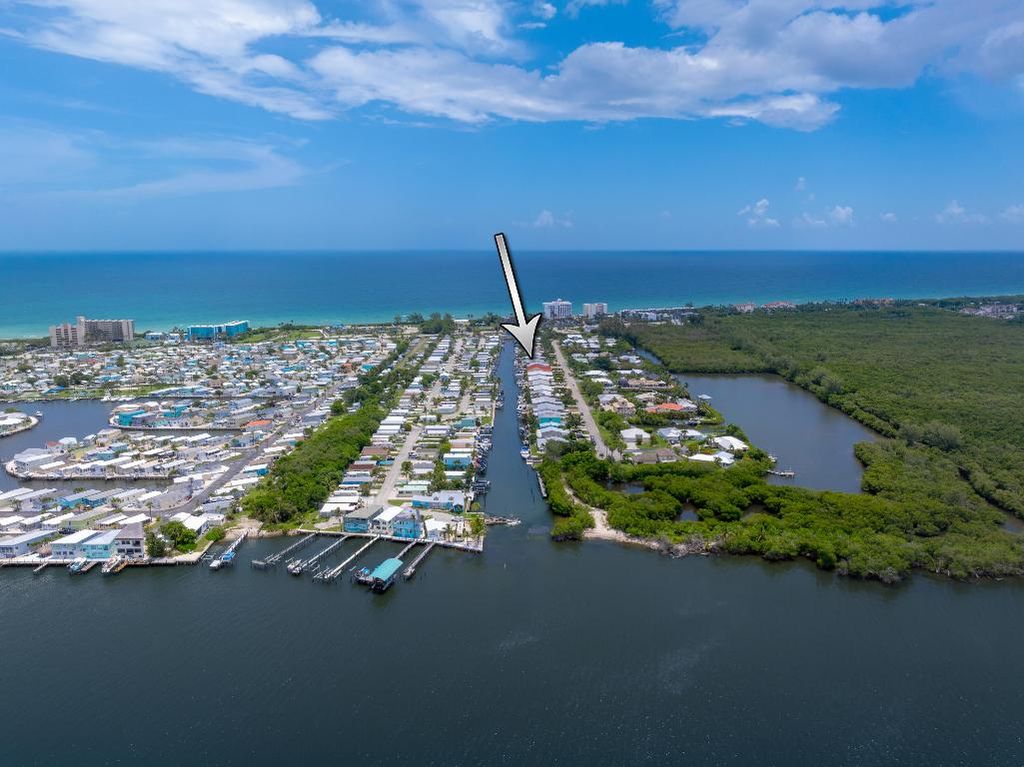Photo of 48 Aqua Ra Drive, Jensen Beach, FL 34957 (MLS # R11136094)