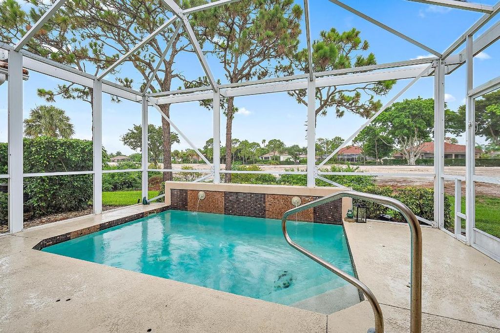 Photo of 8189 Sandpiper Way, West Palm Beach, FL 33412 (MLS # R10996536)