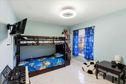 Tiny photo for 970 SW 111th Way, Davie, FL 33324 (MLS # B26037080)