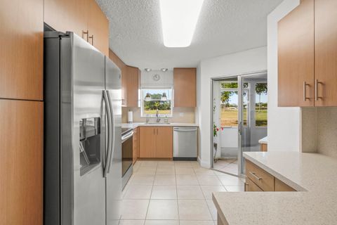 Photo of 3871 Via Poinciana #104, Lake Worth, FL 33467 (MLS # R11127996)