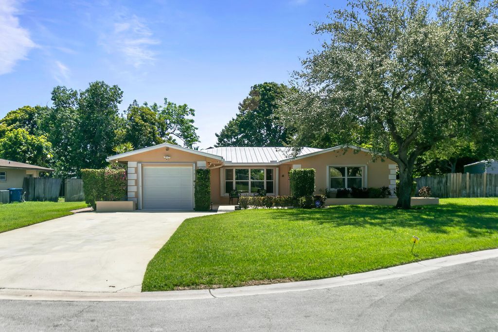 Photo of 102 Mallard Court, Royal Palm Beach, FL 33411 (MLS # R10990780)