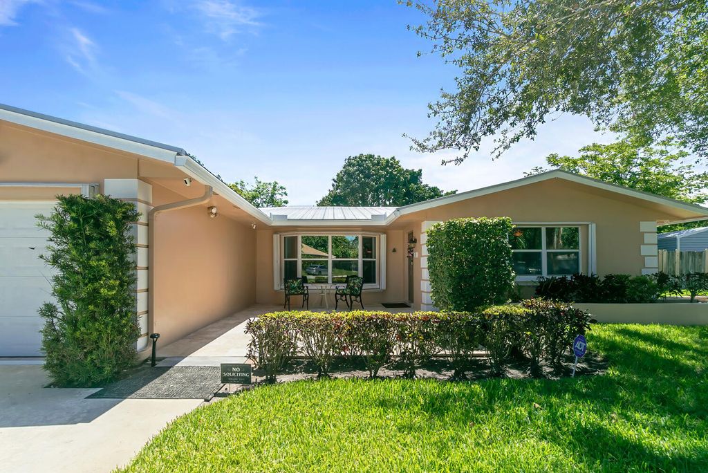 Photo of 102 Mallard Court, Royal Palm Beach, FL 33411 (MLS # R10990780)
