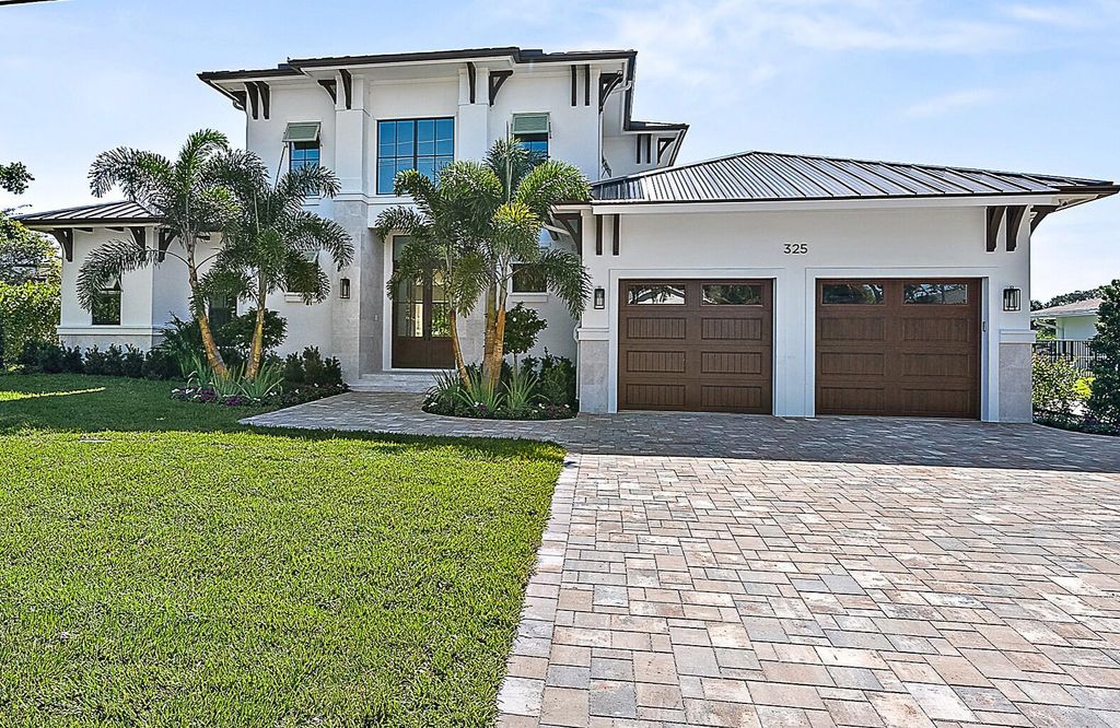 Photo of 325 Fairway N, Tequesta, FL 33469 (MLS # R11073306)