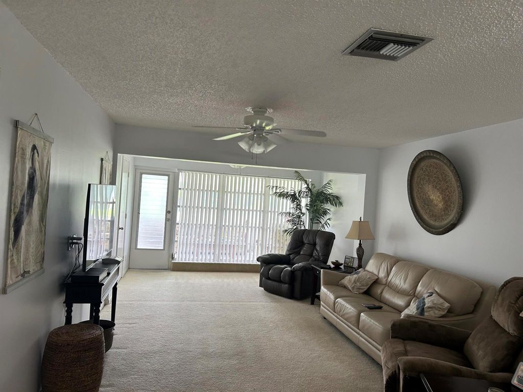 Photo of 1031 Citrus Way #102-A, Delray Beach, FL 33445 (MLS # R11018067)