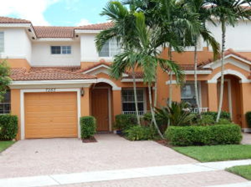 THIS HOME IS A JEWEL! DESIRABLE OPEN FLOORPLAN WITH 1 BEDROOM, WALK-IN CLOSET & 1 BATH DOWN.OWNER SPARED NO EXPENSE WITH UPGRADES IN THIS BEAUTIFUL HOME! GORGEOUS TILE LAID ON THE DIAGONAL DOWNSTAIRS, RICH WOOD CABINETRY IN THE KITCHEN WITH GRANITE COUNTERTOPS, STAINLESS APPLIANCES, OPEN BAR TO LIVING AREA. PANTRY, 9' CEILINGS. UPGRADED BATHS WT CUSTOM TILE. HUGE MASTER WT WALK IN CLOSET, LUXURIOUS MASTER BATH WT WOOD CABINETRY, GRANITE, DOUBLE SINKS, JACUZZI TUB, SEPARATE SHOWER & GORGEOUS TILE FLOOR. 2ND BEDROOM UP HAS FULL PRIVATE BATH. NEW CARPETING UPSTAIRS. OTHER FEATURES INCLUDE IMPACT GLASS WINDOWS & DOORS, HIGH HAT LIGHTING, CEILING FANS, ALARM SYSTEM AND BACK PATIO HAS BEEN EXTENDED WITH ATTRACTIVE PAVERS. ONE CAR GARAGE WITH ELECTRIC DOOR OPENER. MONTHLY MAINTENANCE FEE OF $30