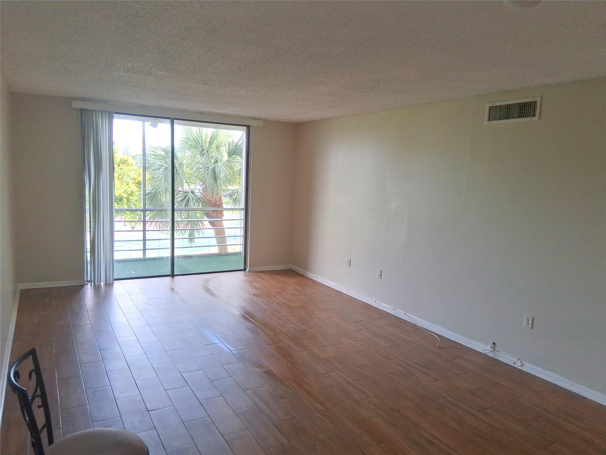 This beautiful 2/2 is for you in the Courtyards of Broward in North Lauderdale. This renovated corner unit is located on the 3rd floor, near the stairs. The laundry room & elevators are conveniently located around the corner. Once inside this cozy yet spacious condo, you are greeted with the kitchen to the left, a large family room with sliding glass doors separating the screened porch. There is plenty of sunlight behind the vertical shades, make use of the utility room & 2 walk-in closets. (1st month deposit - last & security due at move-in) Courtyards of Broward Association requires a 650+ credit score, application & background check is for $150. Courtyards of Broward is walking distance to Hamptons Pines Park, Publix, Broward Meat & Fish & Super Walmart & multiple shopping plazas.