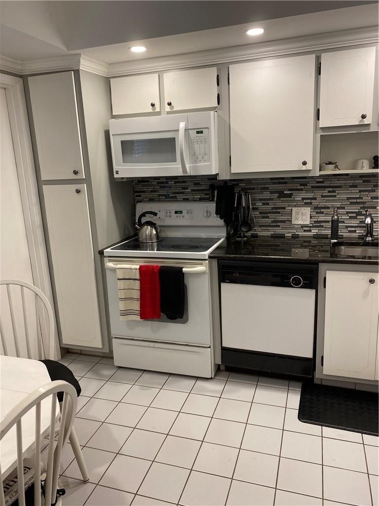 Photo of 2600 S Course Drive #107, Pompano Beach, FL 33069 (MLS # B26078747)