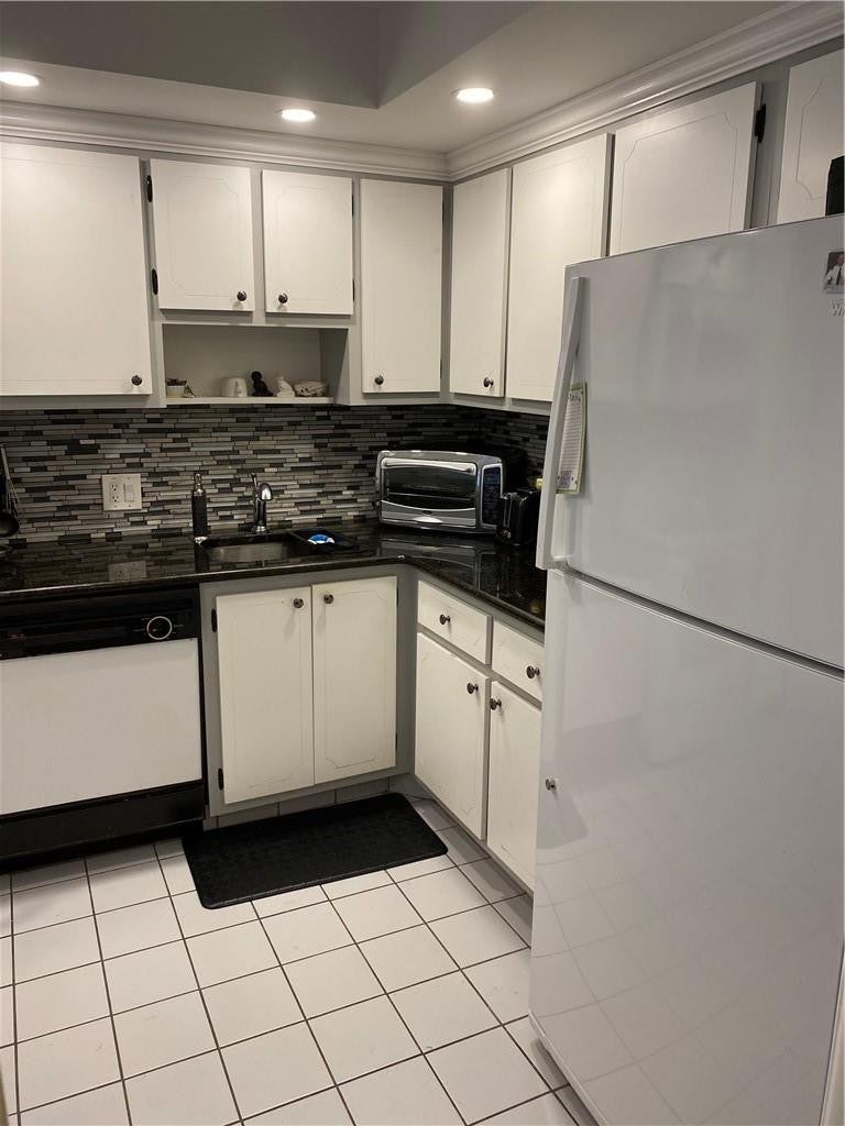 Photo of 2600 S Course Drive #107, Pompano Beach, FL 33069 (MLS # B26078747)