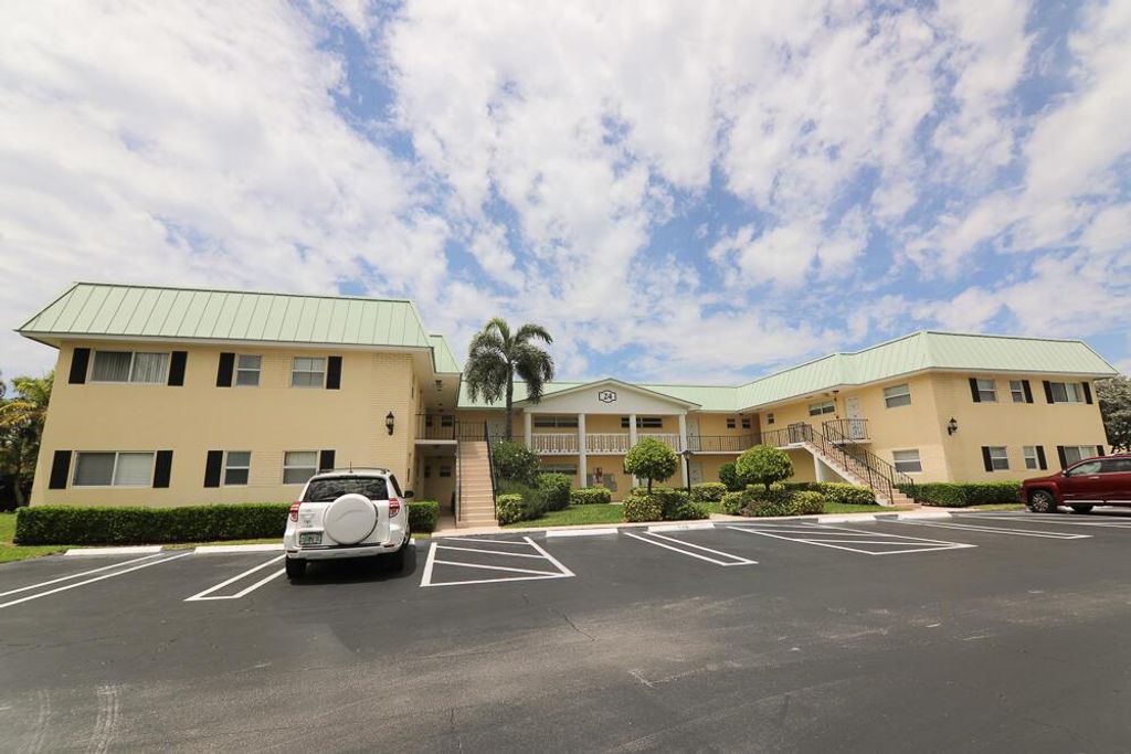 Photo of 24 Colonial Club Drive #202, Boynton Beach, FL 33435 (MLS # R10882528)