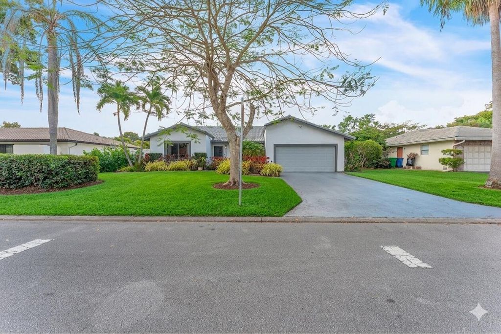 Photo of 10734 NW 20th Drive, Coral Springs, FL 33071 (MLS # B26003479)