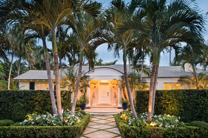 Professionally designed and renovated four bedroom home. Featured in Design Magazine. Outstanding outdoor loggia overlooking a 40 foot lap pool surrounded by gracious gardens. Impact windows and french doors. Two car garage. One level Bermuda on the sunny south side of lovely Via Linda.