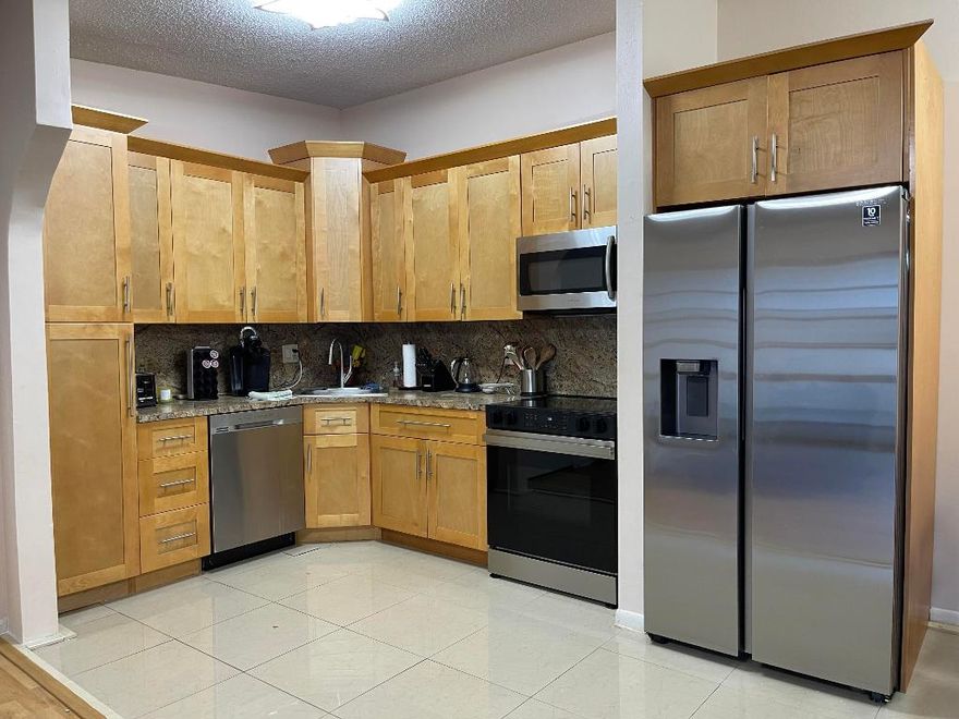 2 bedroom 2 bath, 2nd Floor, next to the pool, in the gated 55+ Kings Point community in Tamarac. This corner unit features an open kitchen and dining area with stainless steel appliances, tile floor, washer dryer, and screened porch. Maintenance fee includes water, sewer, pest control, trash, landscaping, roof repairs, paint, cleaning services of the outside areas, Cable TV, internet, bus service,  exercise room, heated pools, Gym, Theater, and classes.  Easy access to Shopping, Restaurants, Highways and Hospitals. NO RENTING FOR FIRST TWO YEARS OF OWNERSHIP, one resident must be over 55.