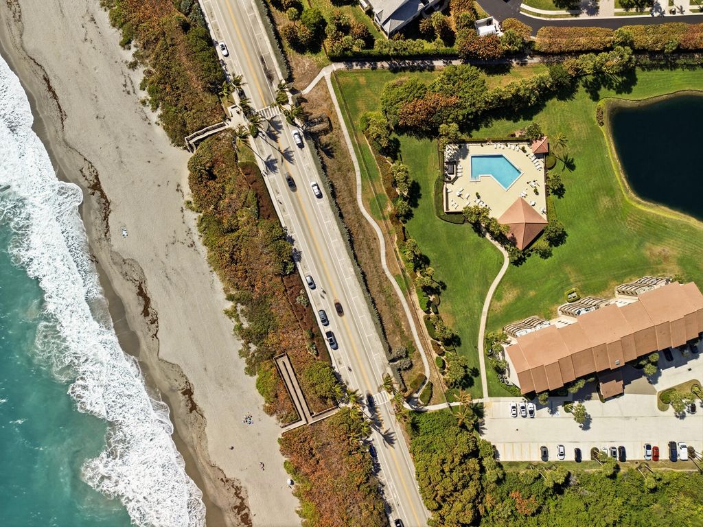 Photo of 401 Ocean Bluffs Boulevard #104, Jupiter, FL 33477 (MLS # R11168919)