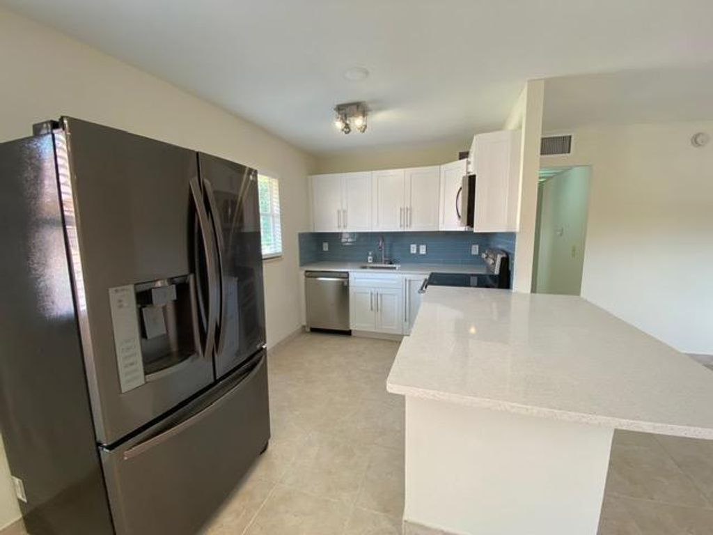 Photo of 668 Saxony Place N, Delray Beach, FL 33446 (MLS # R11156820)