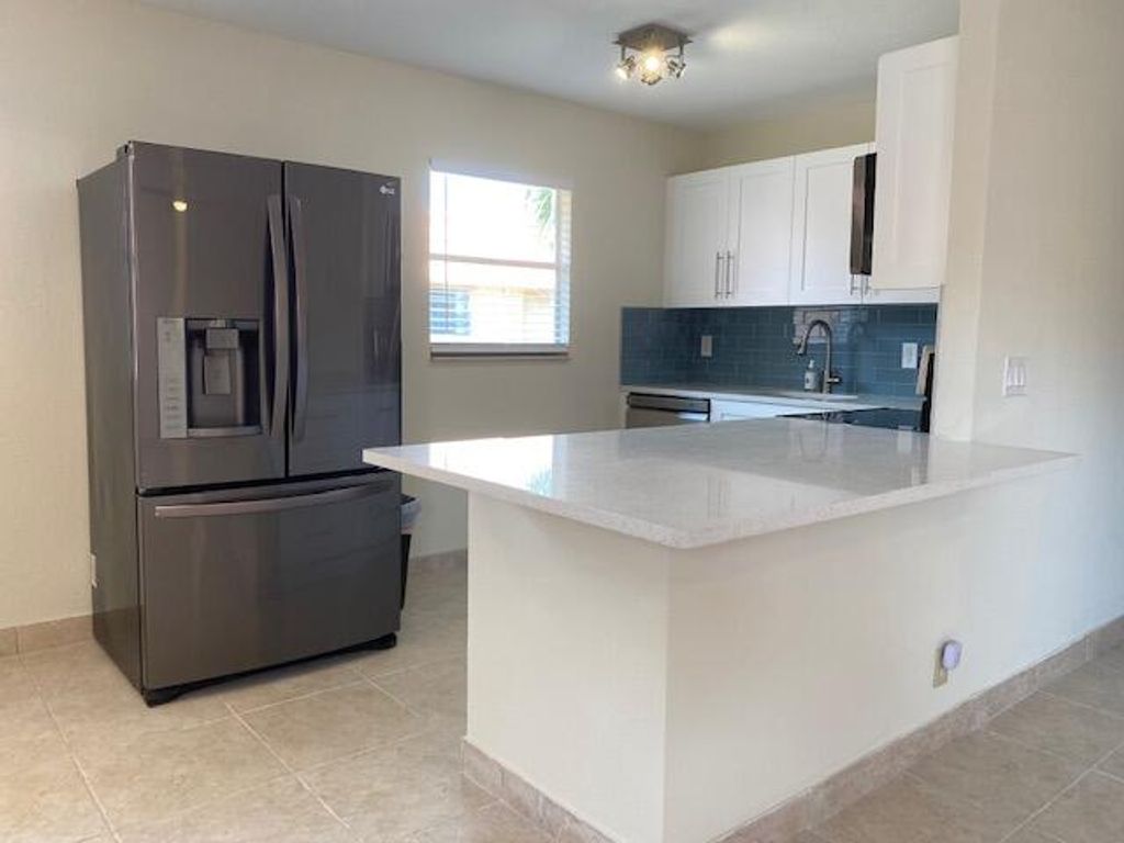 Photo of 668 Saxony Place N, Delray Beach, FL 33446 (MLS # R11156820)