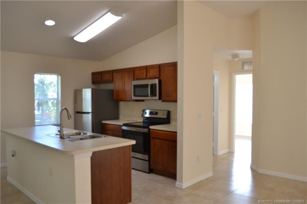 Photo of 2382 SE Merrill Road, Port Saint Lucie, FL 34952 (MLS # R11055675)