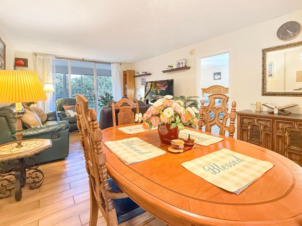 Photo of 3070 NW 48th Terrace #414, Lauderdale Lakes, FL 33313 (MLS # B26043898)