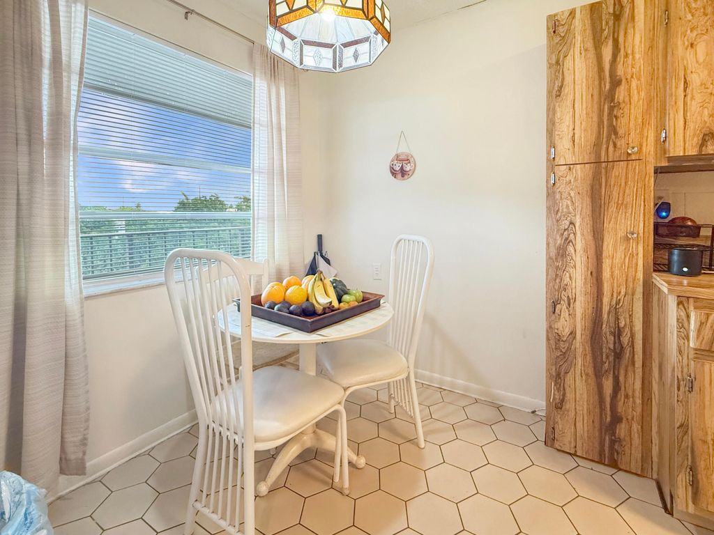 Photo of 3070 NW 48th Terrace #414, Lauderdale Lakes, FL 33313 (MLS # B26043898)