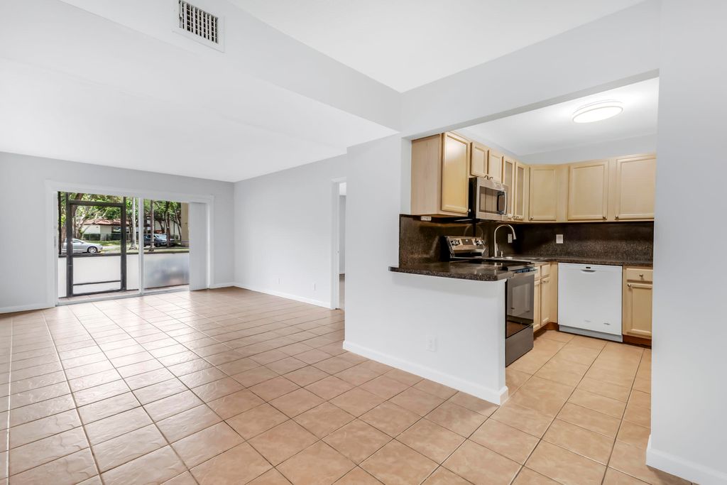 Photo of 490 NW 20th Street #1030, Boca Raton, FL 33431 (MLS # B26010297)