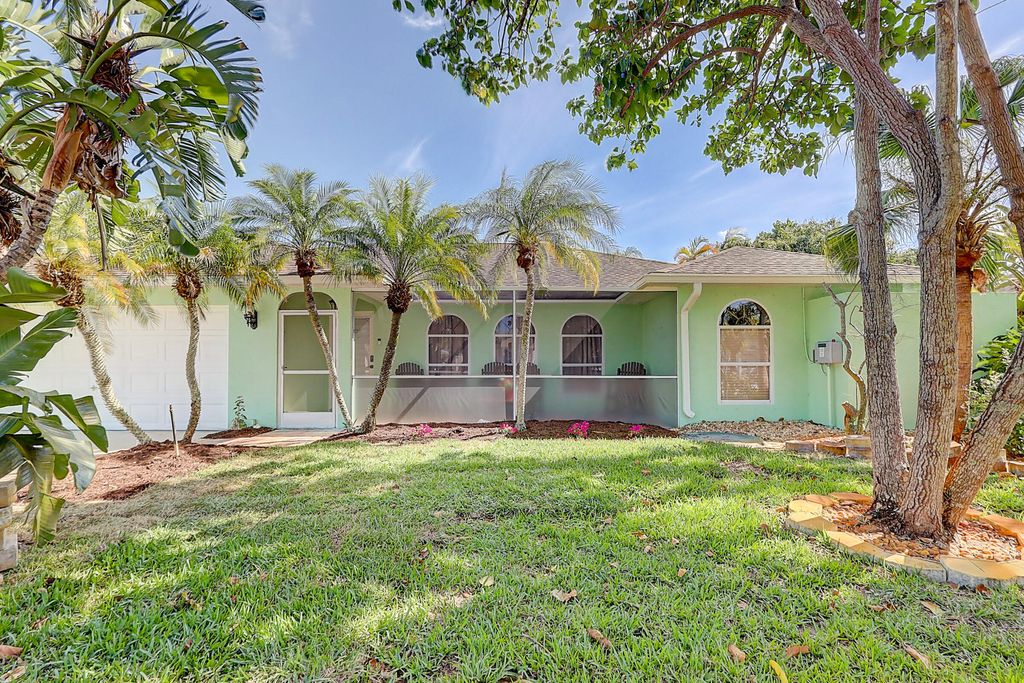 Photo of 238 SW Grove Avenue, Port Saint Lucie, FL 34983 (MLS # R11134464)