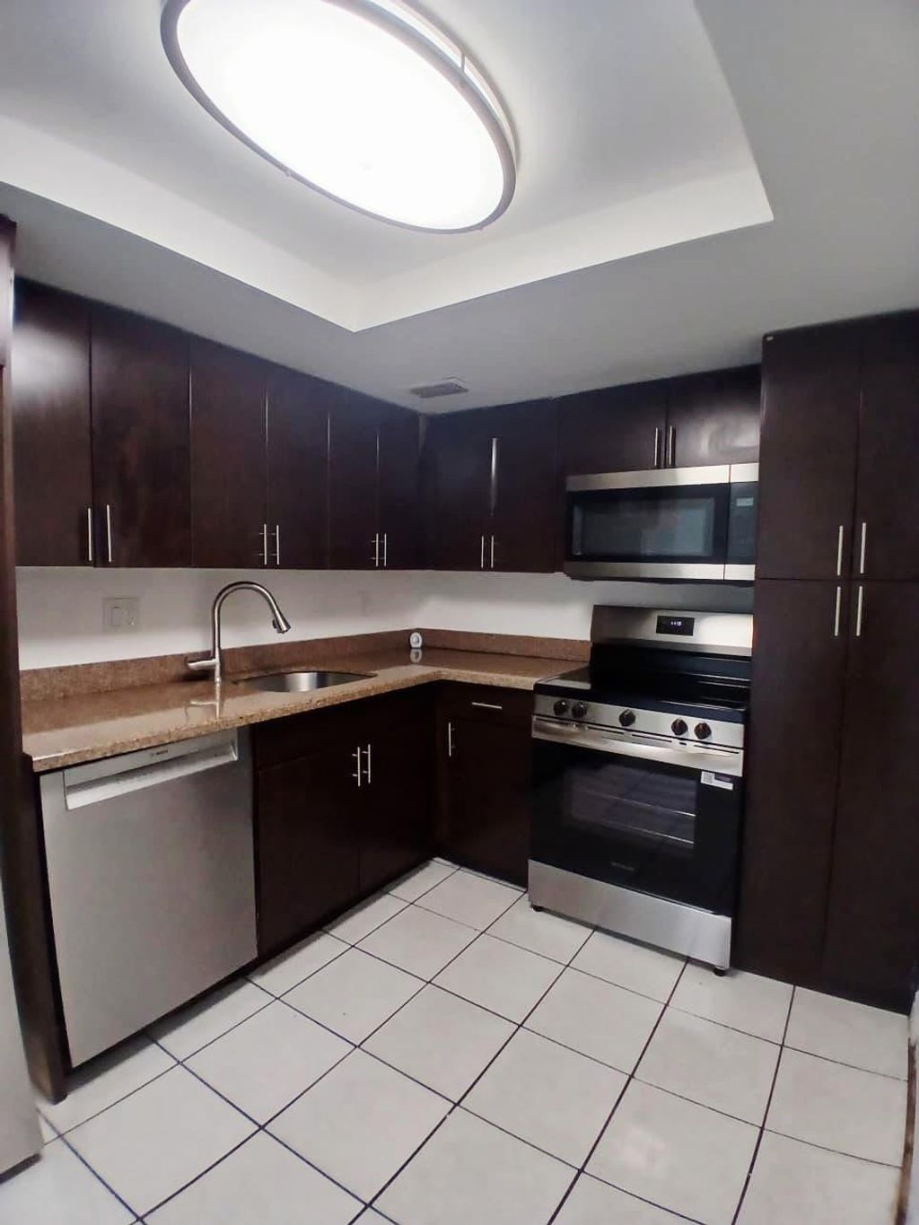 Photo of 1200 SW 50th Ave #112-3, North Lauderdale, FL 33068 (MLS # F10520772)