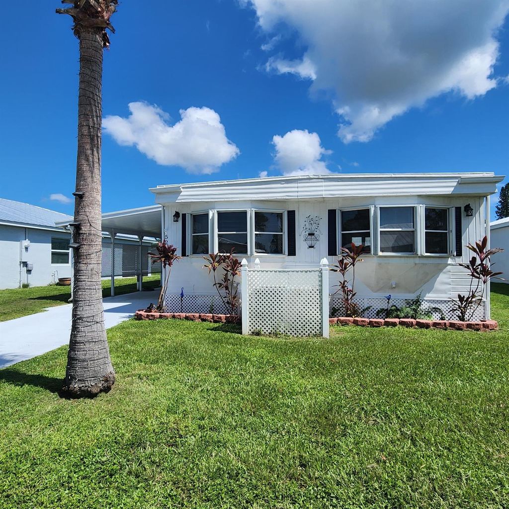 Photo of 52 Spanish Way, Port Saint Lucie, FL 34952 (MLS # R11012258)