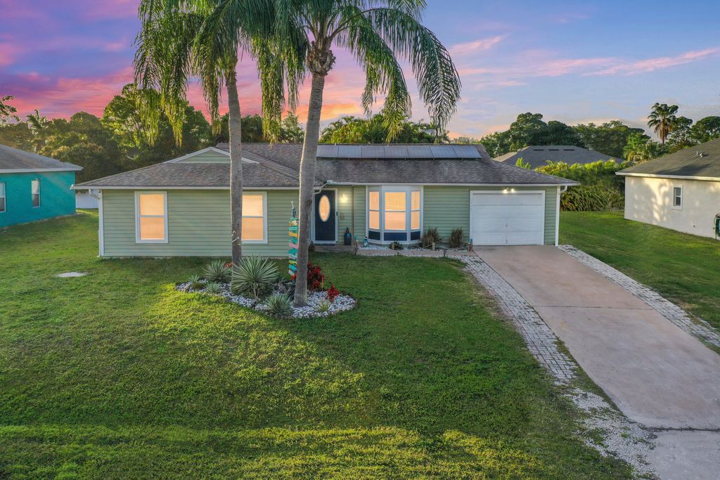 Photo of 1918 SE Cheltenham Street, Port Saint Lucie, FL 34983 (MLS # R10956184)