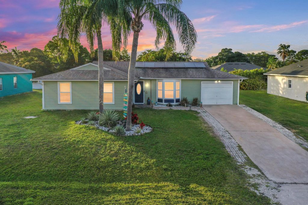 Photo of 1918 SE Cheltenham Street, Port Saint Lucie, FL 34983 (MLS # R10956184)