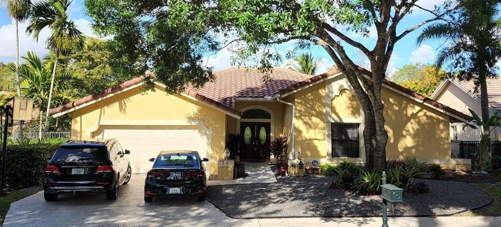 Photo of 1818 Park Avenue, Weston, FL 33326 (MLS # F10548271)