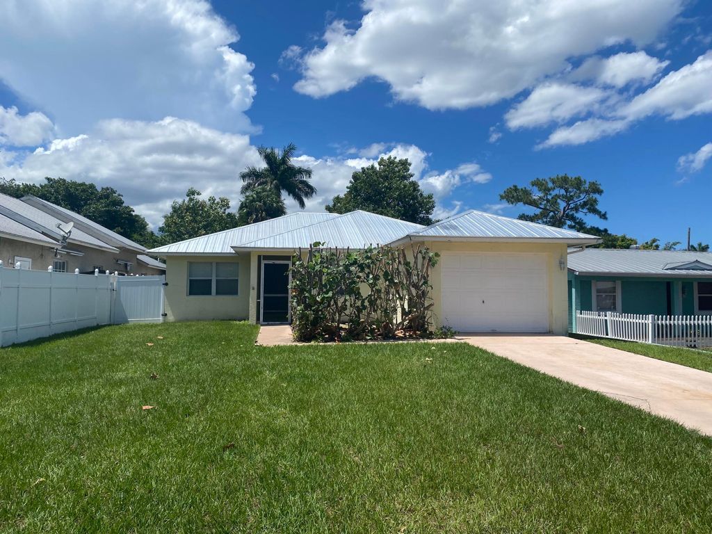Photo of 1057 SW Spruce Street, Palm City, FL 34990 (MLS # R11157779)
