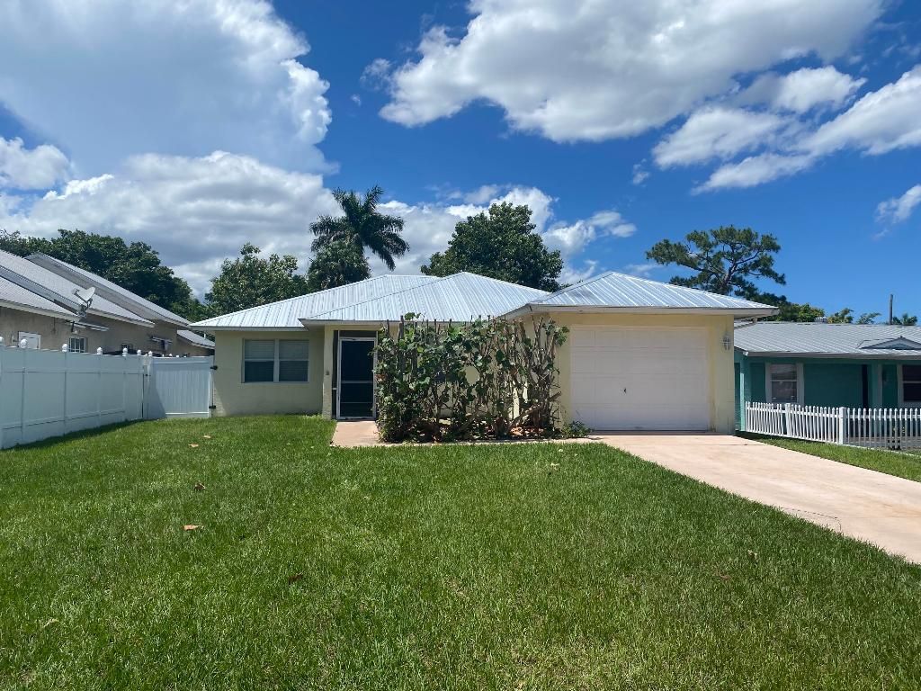 Photo of 1057 SW Spruce Street, Palm City, FL 34990 (MLS # R11157779)