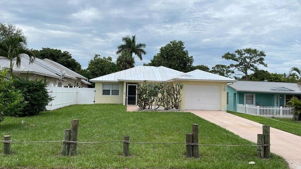 Photo of 1057 SW Spruce Street, Palm City, FL 34990 (MLS # R11157779)