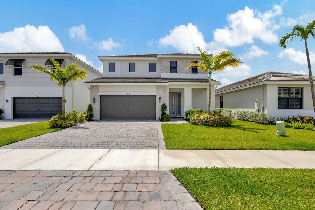 Photo of 7158 Rockwood Road, Jupiter, FL 33458 (MLS # R11016381)