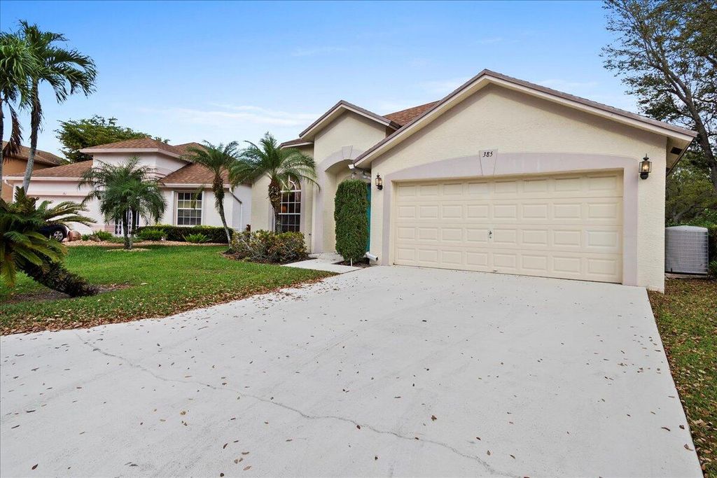 Photo of 385 Hammocks Trail, Greenacres, FL 33413 (MLS # R11065974)
