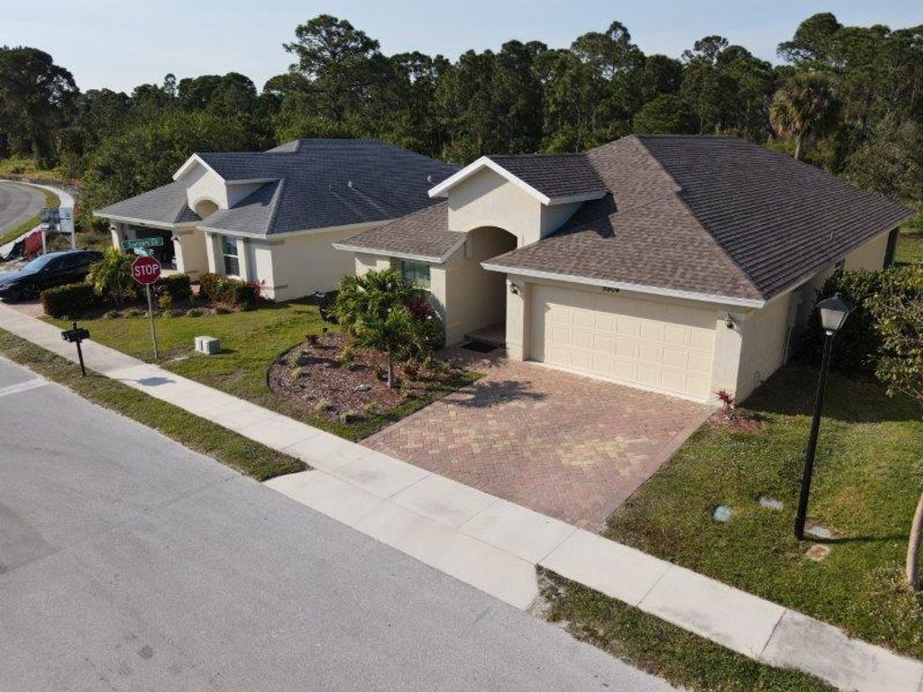 Photo of 9804 Palm Breezes Drive, Fort Pierce, FL 34945 (MLS # R10963836)