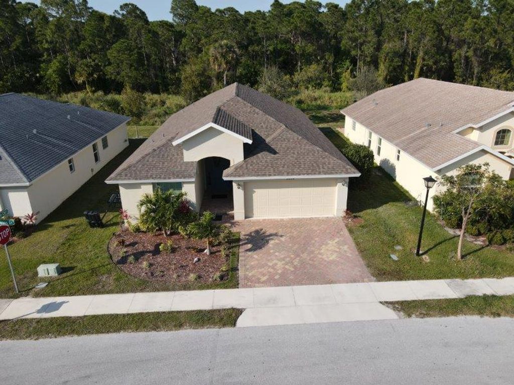 Photo of 9804 Palm Breezes Drive, Fort Pierce, FL 34945 (MLS # R10963836)