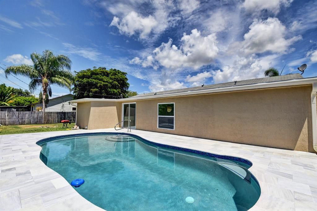 Photo of 9220 Melody Road, Lake Worth, FL 33467 (MLS # R10823397)