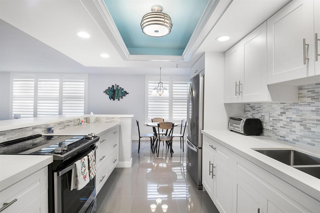 Beautiful boutique condominium building on the sand in coveted Highland Beach! Enjoy luxury amenities including private beach access in this newly updated 3BR/2.5BA unit with professionally designed decor throughout. Full impact glass with plantation shutter blinds on all windows/sliders. Extensive building updates recently completed including concrete restoration, glass balcony railings and a beautifully renovated, lobby gym, & hallways! 2 garage spaces. $10k/mo if Tenant wants 4+ months.