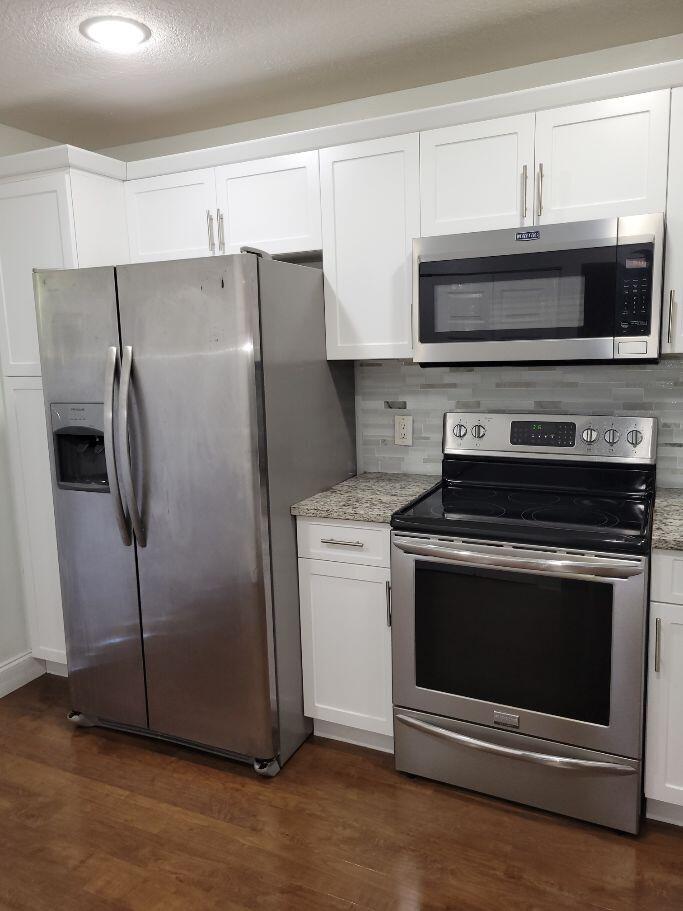 SHEFFIELD WOODS AT WELLINGTON CONDO - Residential Lease