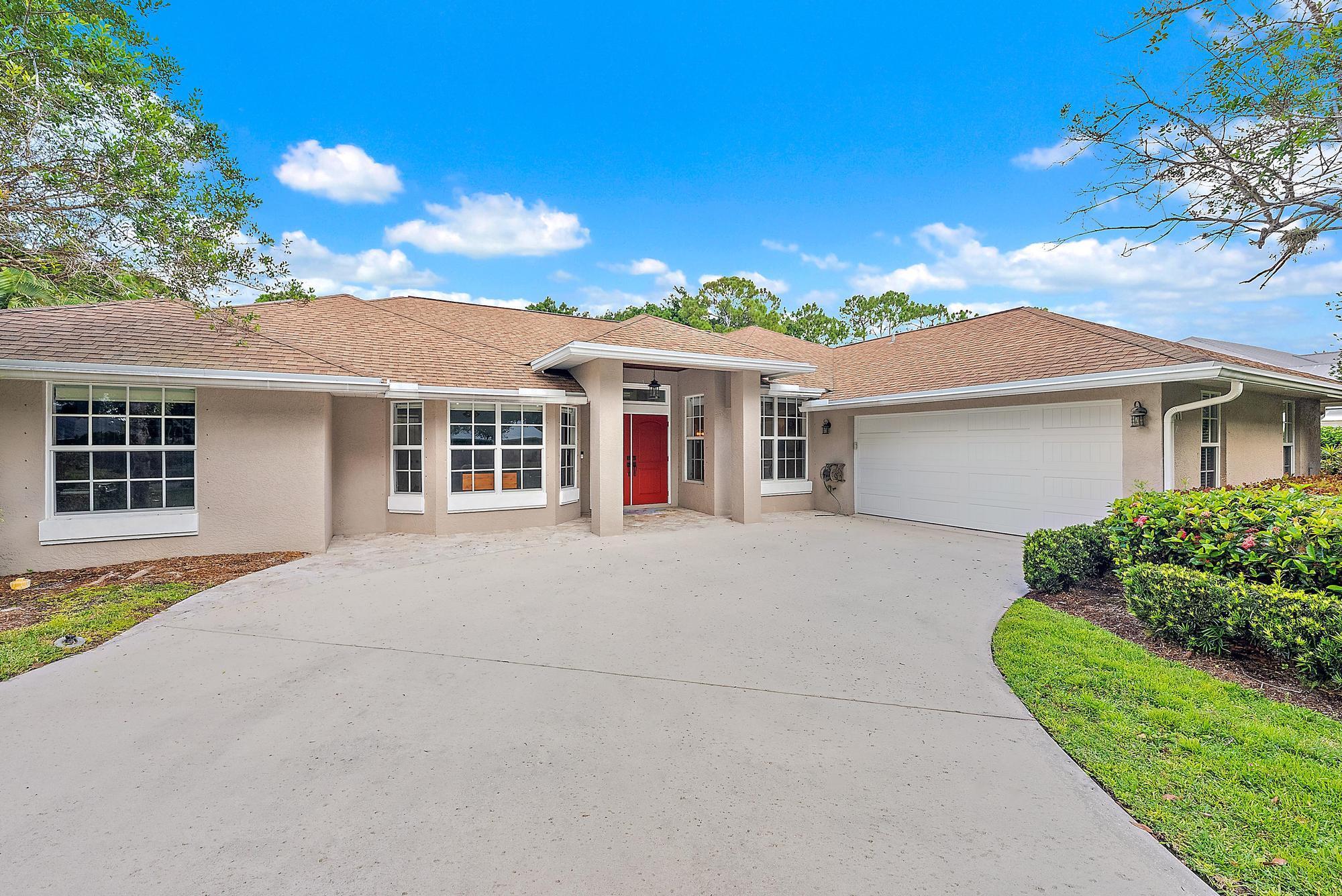 Welcome to Danforth! Palm City's most desirable gated community. This spacious CBS home offers tons of open living space, featuring 4 bedrooms and 3 full bathrooms--including DUAL PRIMARY SUITES with walk in closets and an enclosed patio bonus space! This home is perfect for entertaining, multigenerational living and guest privacy. Recent upgrades include a 2024 hot water heater, 2023 A/C, and hurricane-impact windows and doors. Inside, you'll find a bright, open layout, updated kitchen and baths, and ample storage. Step outside to enjoy a beautiful screened lanai and sparkling heated pool and hot tub and a lush, private backyard. Set on a tranquil, tree-lined street just minutes from top-rated Martin County schools, this home is the best of Palm City living!