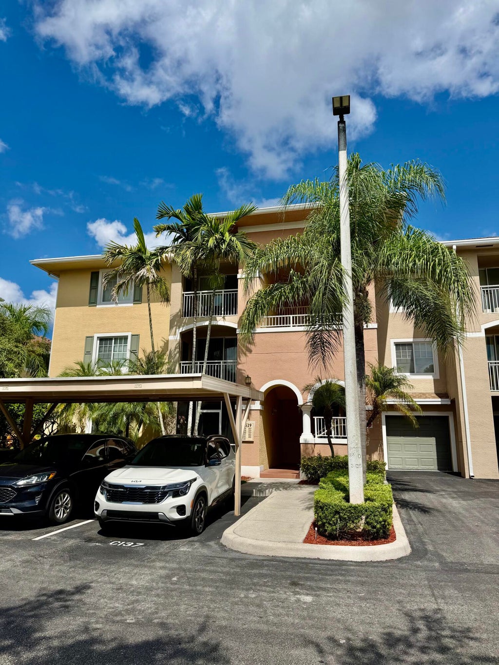 Photo of 6529 EMERALD DUNES Drive #302, West Palm Beach, FL 33411 (MLS # B26054309)