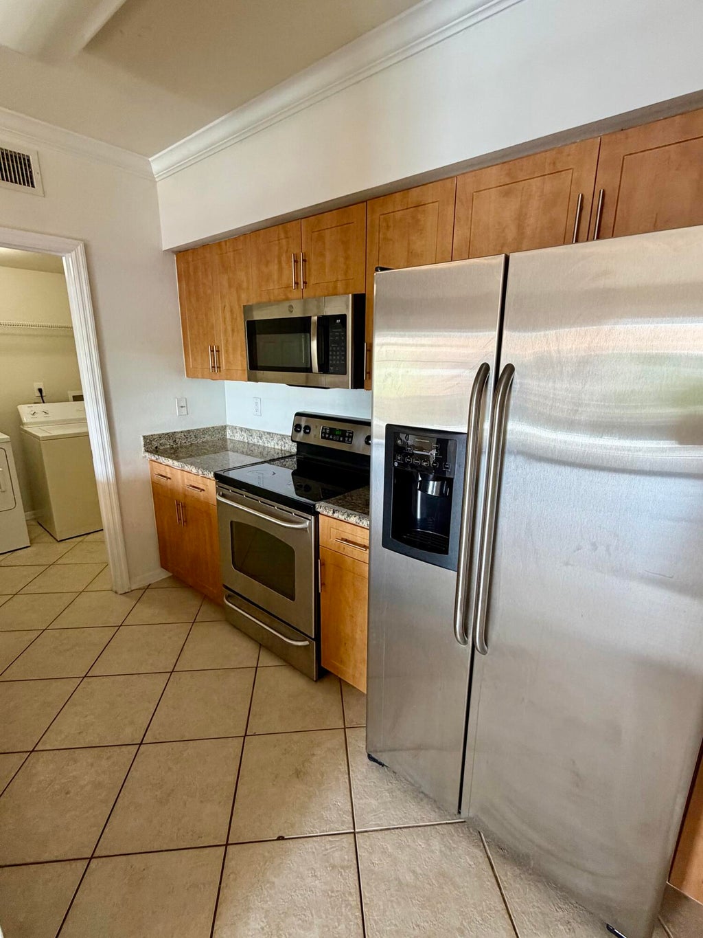 Photo of 6529 EMERALD DUNES Drive #302, West Palm Beach, FL 33411 (MLS # B26054309)