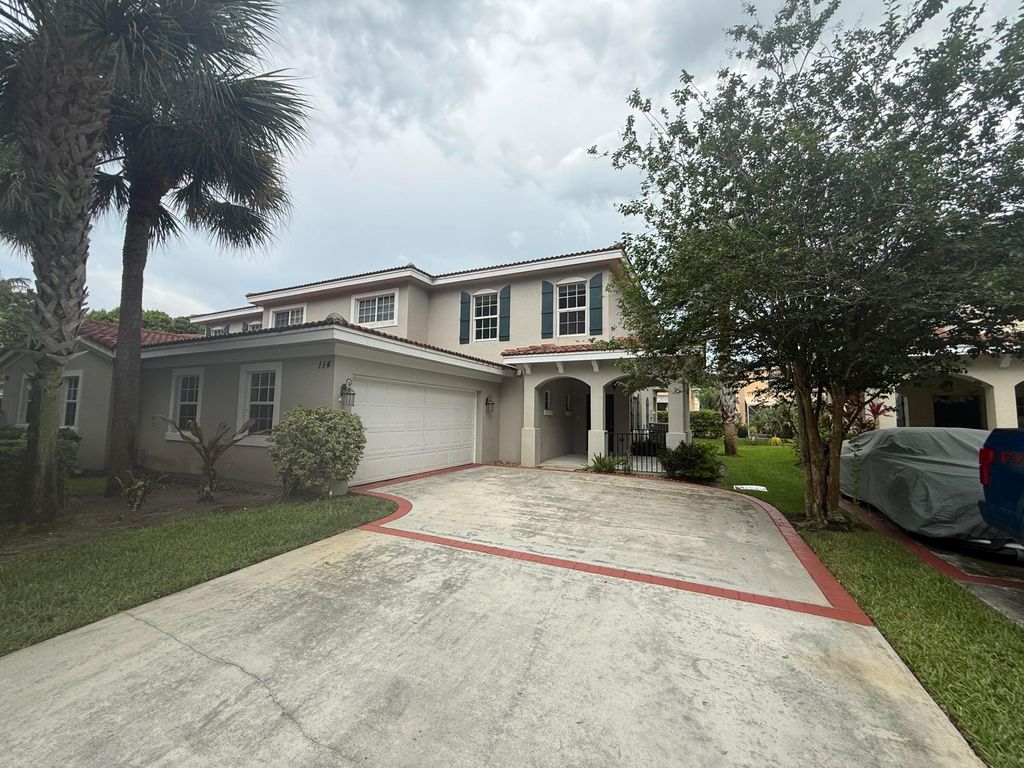 Photo of 114 Owl Pointe Circle, Jupiter, FL 33458 (MLS # B26035614)
