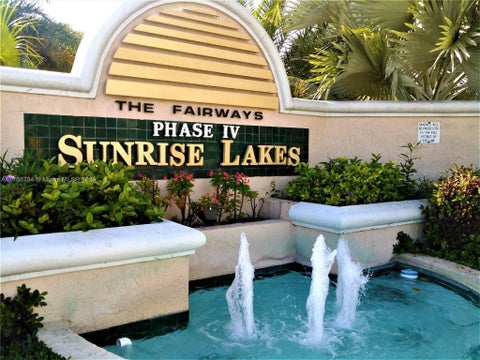 Photo of 10304 Sunrise Lakes Blvd #312, Sunrise, FL 33322 (MLS # R11110033)