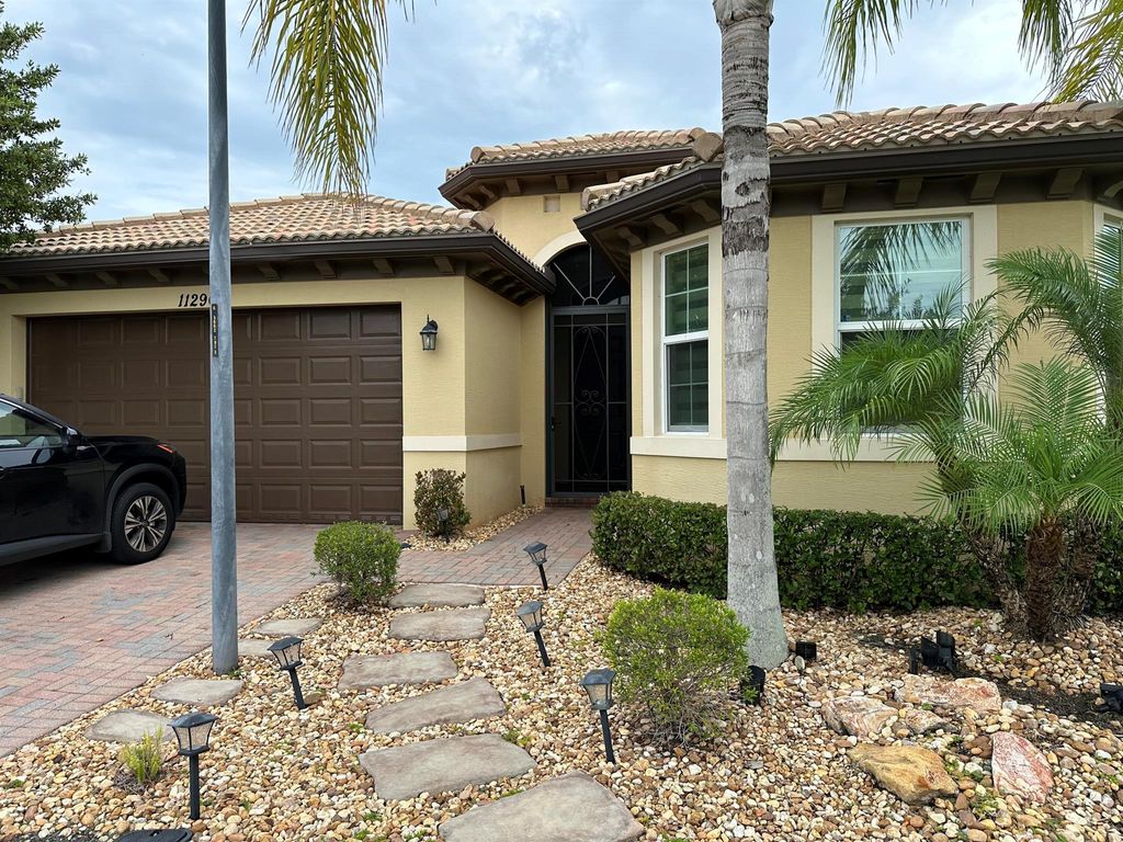 Photo of 11290 SW Wyndham Way, Port Saint Lucie, FL 34987 (MLS # R11004461)