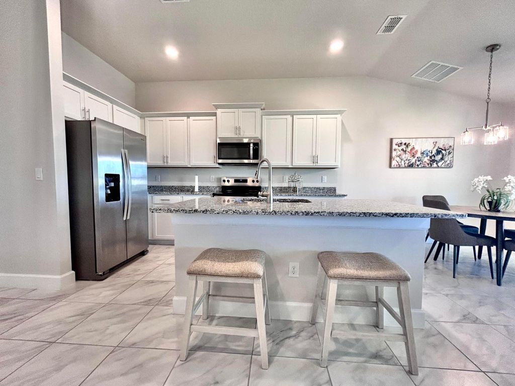 Photo of 8826 Waterstone Boulevard, Fort Pierce, FL 34951 (MLS # B26007428)