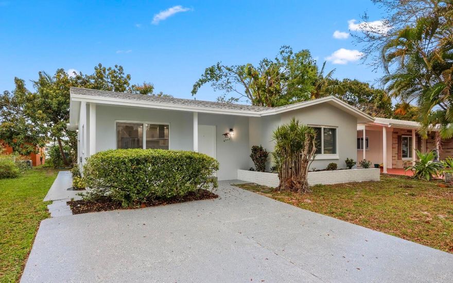 Fully remodeled 3-bedroom, 2-bath home located in the ALL AGES section of Mainlands! This stunning property has been completely updated inside and out and truly feels like a brand-new home. Features include a new roof, hurricane impact windows, brand-new kitchen, beautifully renovated bathrooms, and luxury vinyl plank (LVP) flooring throughout. The modern kitchen offers stainless steel appliances and stylish finishes, perfect for everyday living and entertaining. Additional highlights include an inside laundry room with washer and dryer and thoughtful upgrades throughout the home. Absolutely gorgeous and move-in ready!