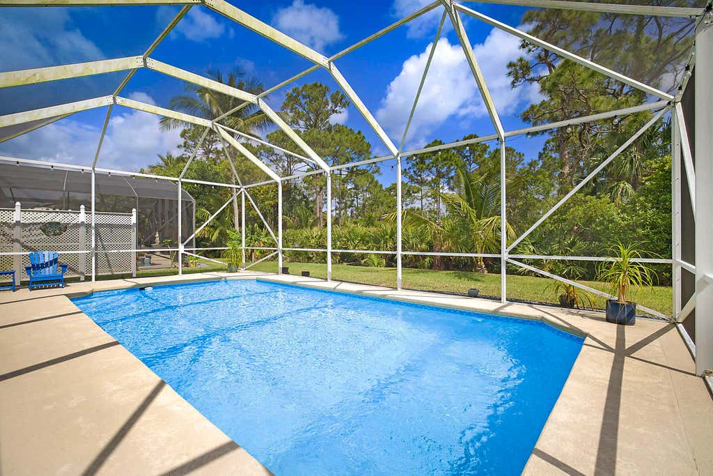 Photo of 7004 SE Twin Oaks Circle, Stuart, FL 34997 (MLS # R11086850)