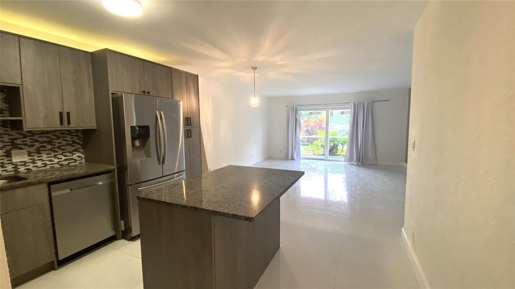 Photo of 770 SE 2nd Avenue #F101, Deerfield Beach, FL 33441 (MLS # F10555399)