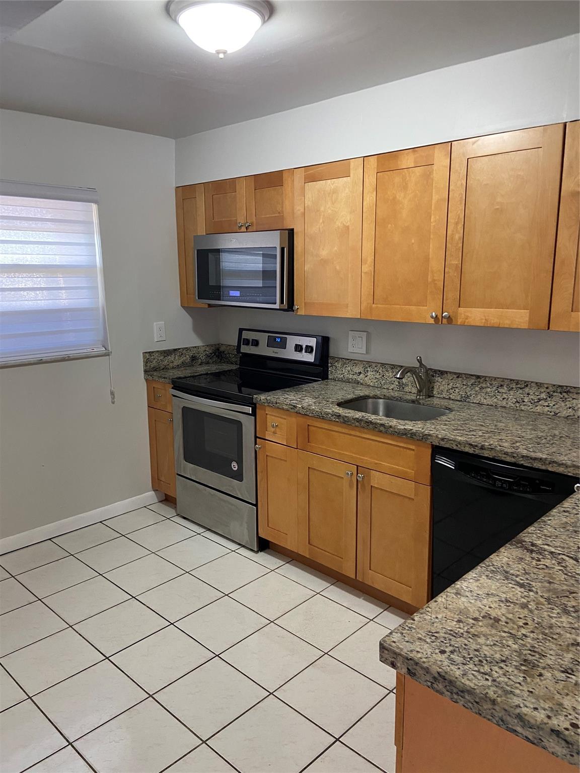 BEAUTIFUL 2 BEDROOM 2 BATHROOM CONDO IN THE HEART OF MIRAMAR, UPDATED KITCHEN AND BATH, SS APPLIANCES, TILE FLOORS THROUGHOUT, UNIT IS FRESHLY PAINTED, SPACOUS AND AIRY, CLOSE TO SCHOOLS, SHOPPING, HWYS AND PARKS, EZ TO SHOW.